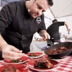 Chef cooking with strawberries