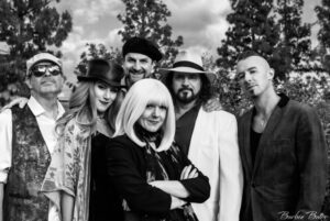 A lively group of performers at the California Strawberry Festival entertainment stage.